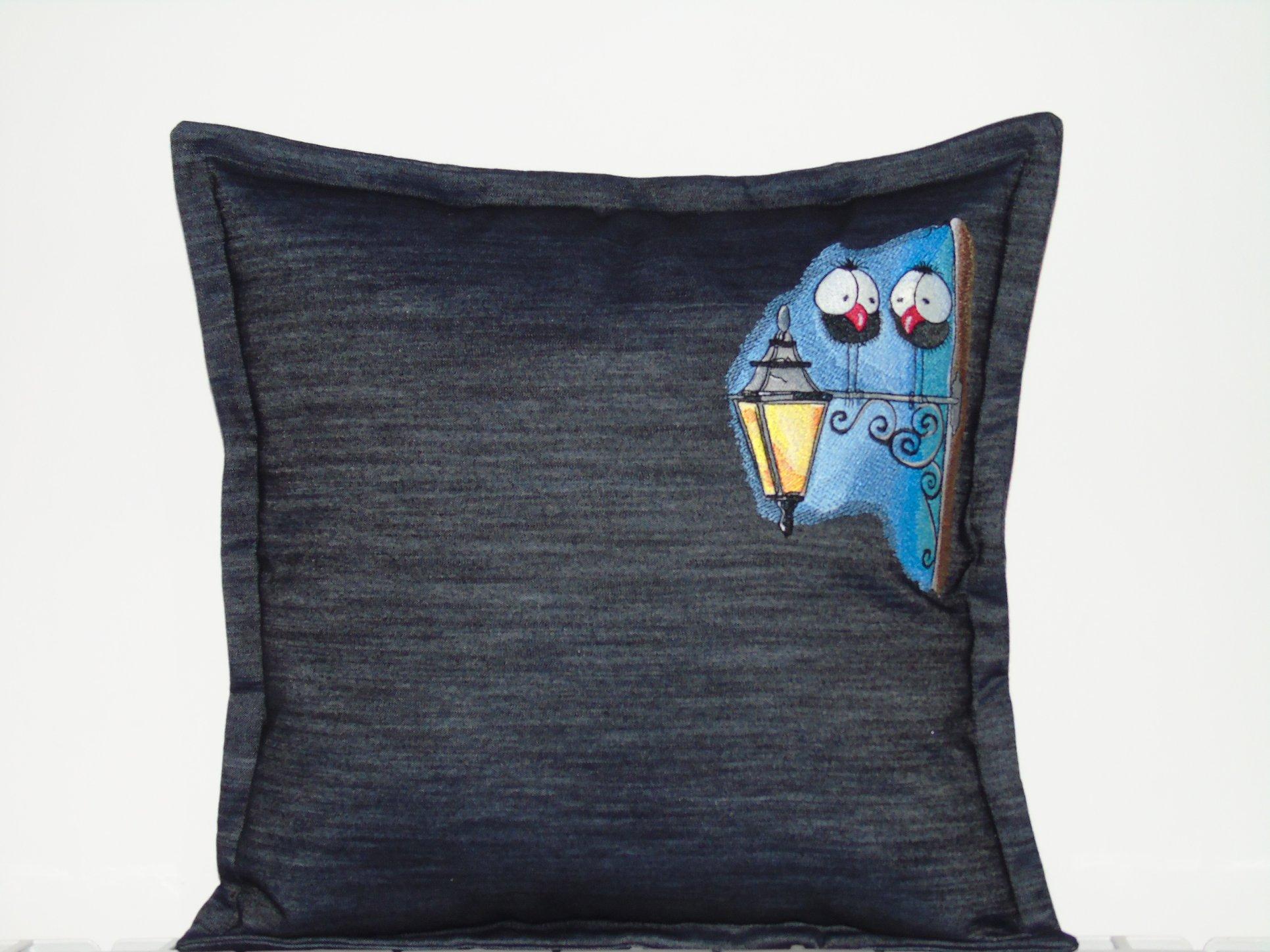 Embroidered cushion with Two birds design