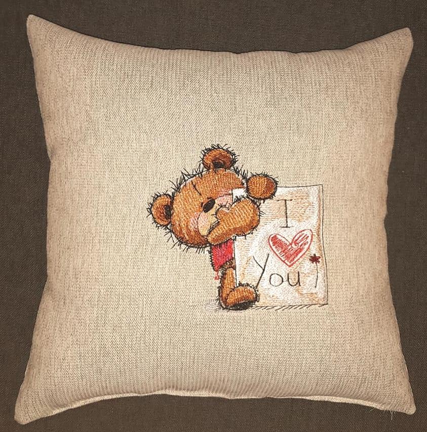 Embroidered cushion with Teddy I love you design