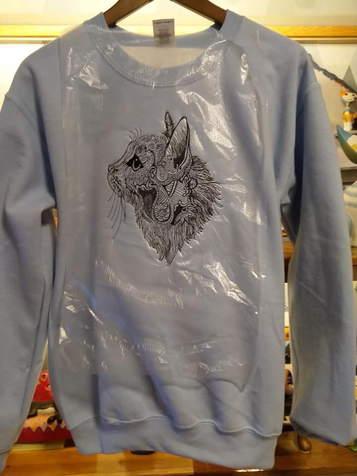 Embroidered sweater with Mosaic cat design