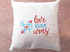 Embroidered cushion with Love always wins free design