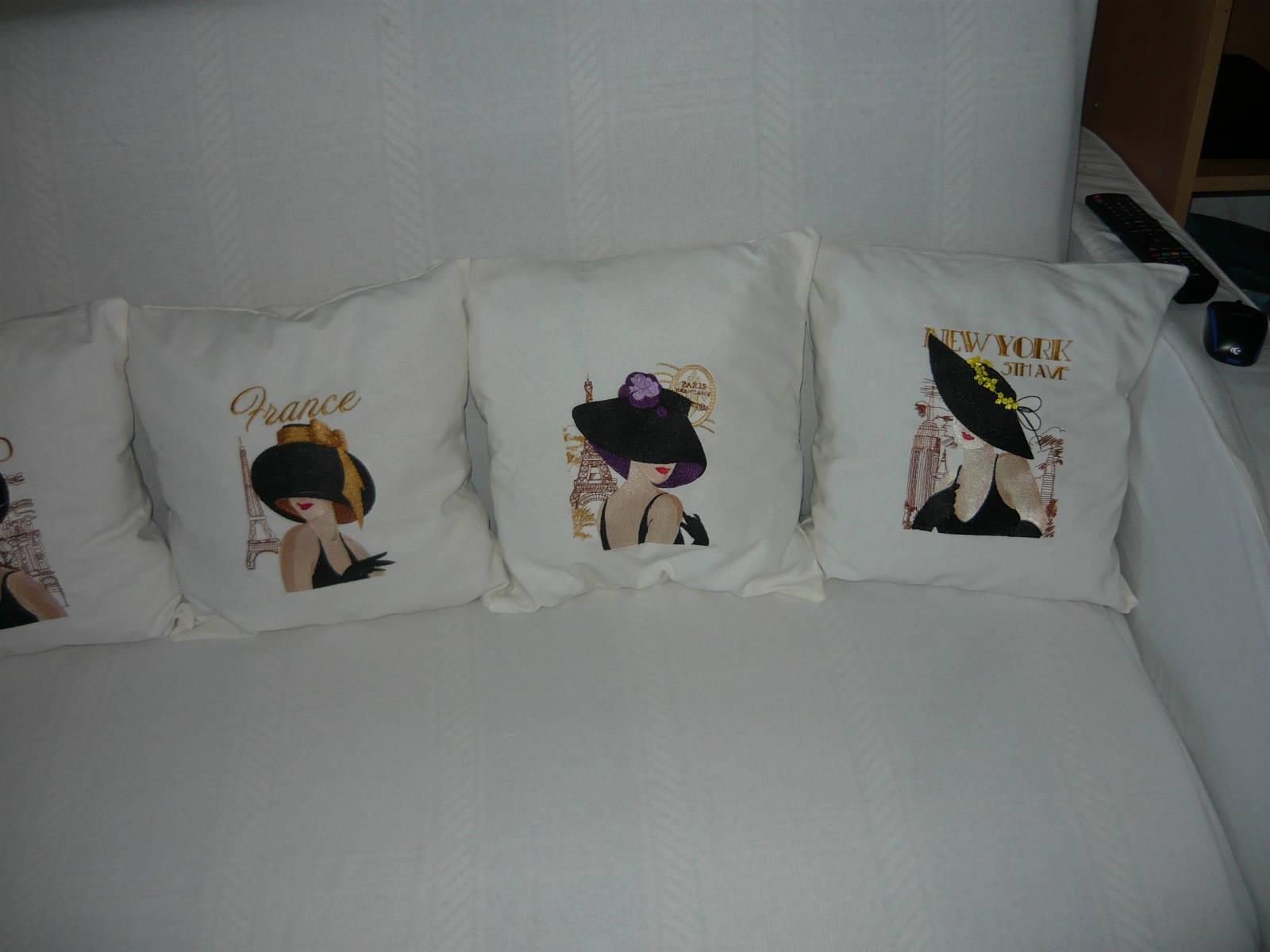 A set of pillows with dames from the world's famous capitals