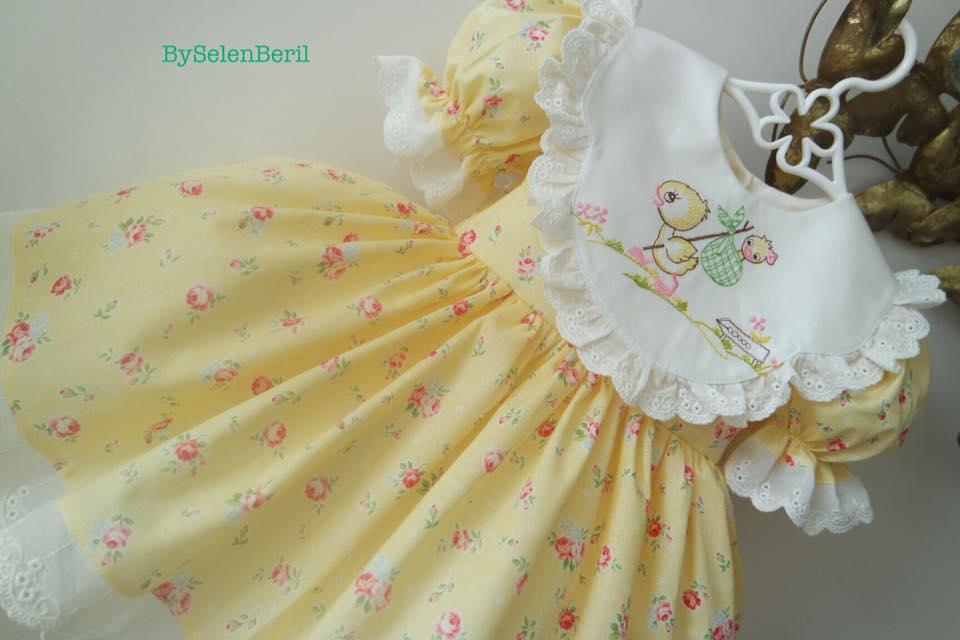 Embroidered child dress with LIttle duck design