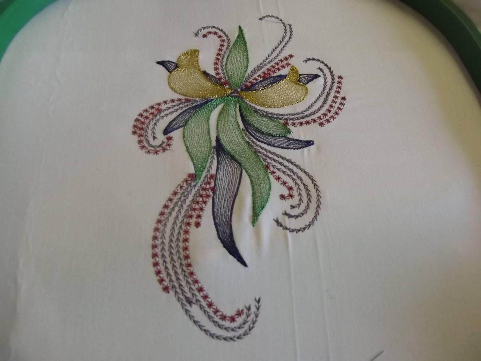 Swirl flower free embroidery design