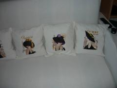 A set of pillows with dames from the world's famous capitals