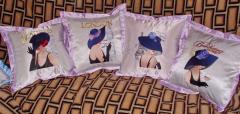 Another set of pillows decorated with beautiful ladies from different cities