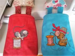 Embroidered textile baskets with Mice designs