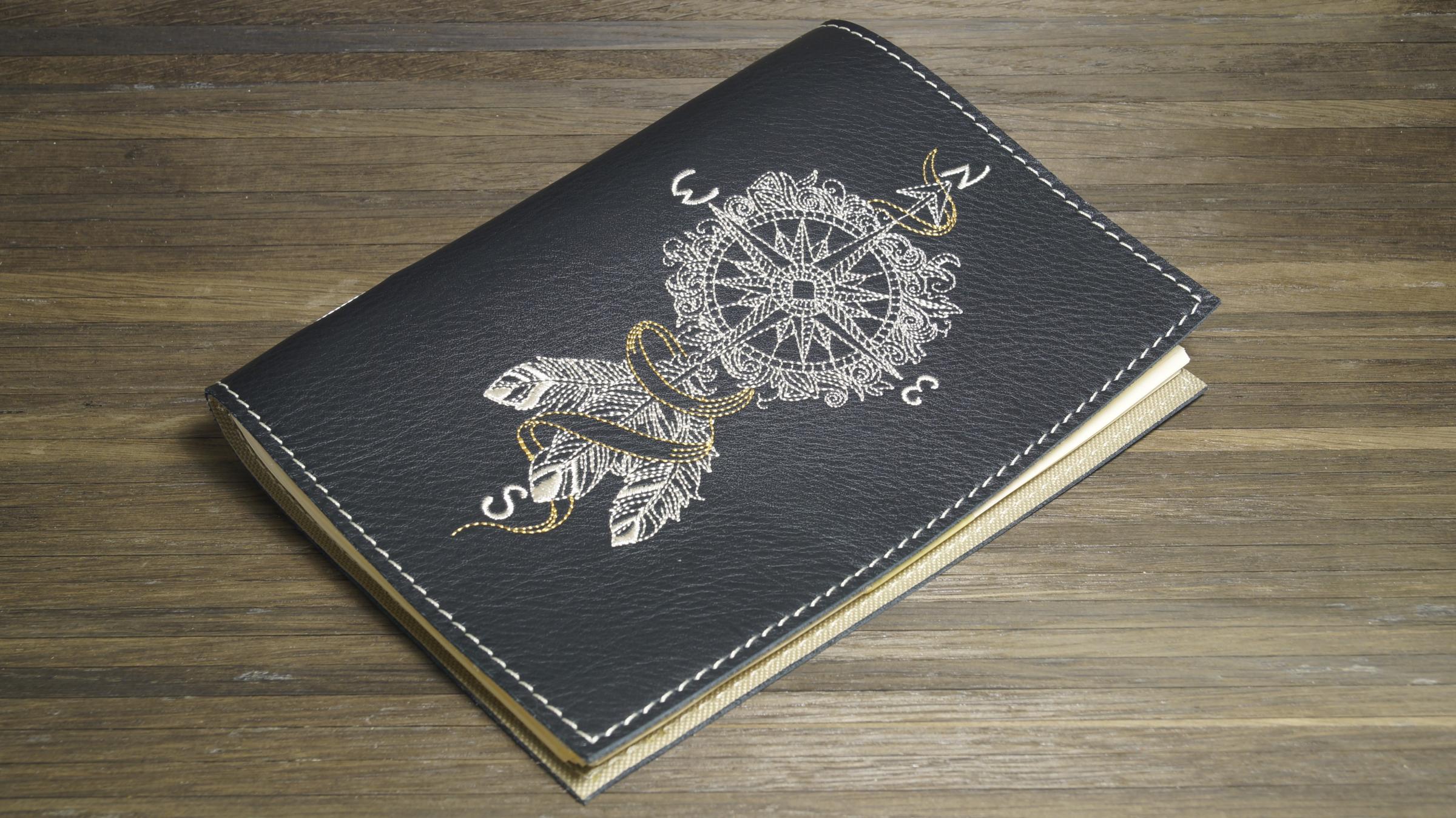 Embroidered cover with Compass embroidery design