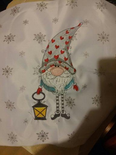 Gnome with lantern embroidery design