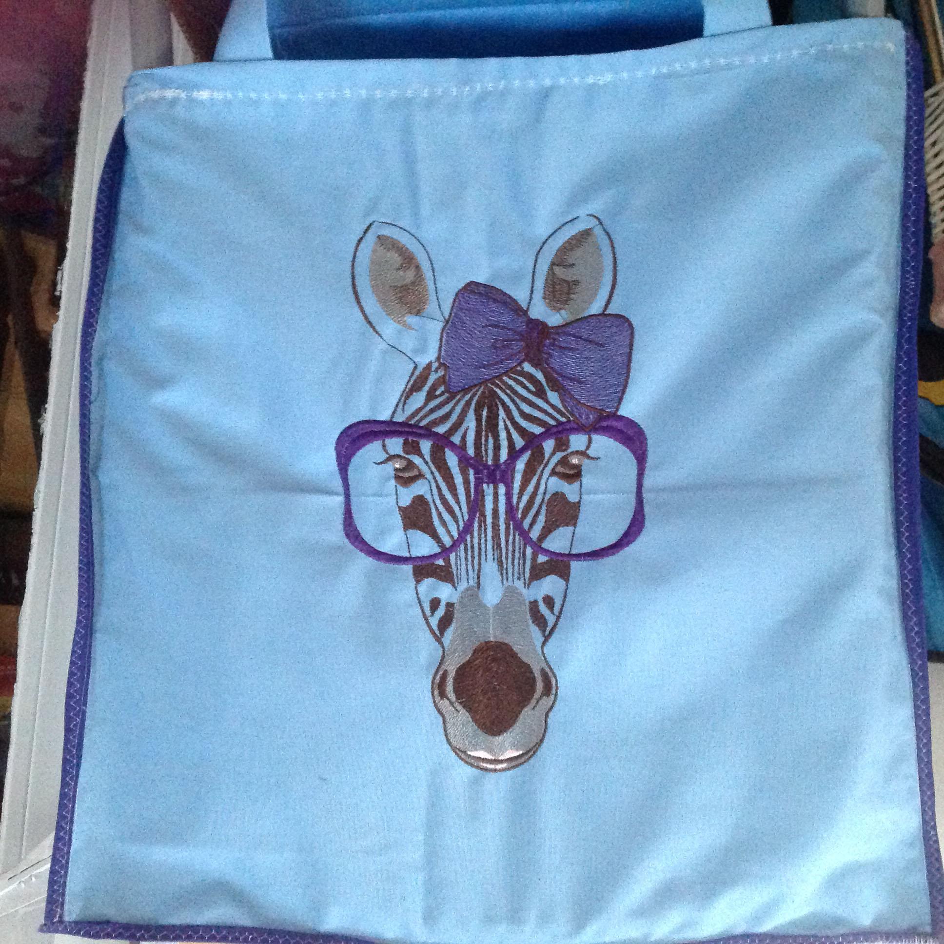 Embroidered bag with zebra design