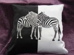 Embroidered pillow with two zebras design