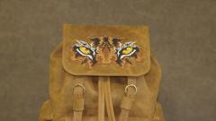 Unleash Wild Side: Stunning Tiger Eyes Embroidery Design on Backpacks