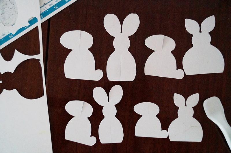 Joining the parts of the bunnies Paper Easter bunnies