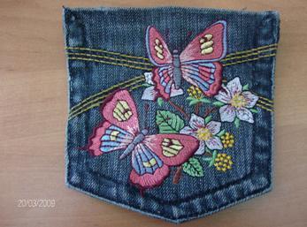 Jeans pocket with colorful machine embroidery