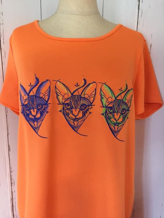 Geometric Sphynx on embroidered t-shirt