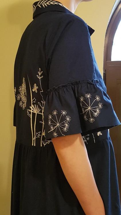 Embroidered dress with flower season design