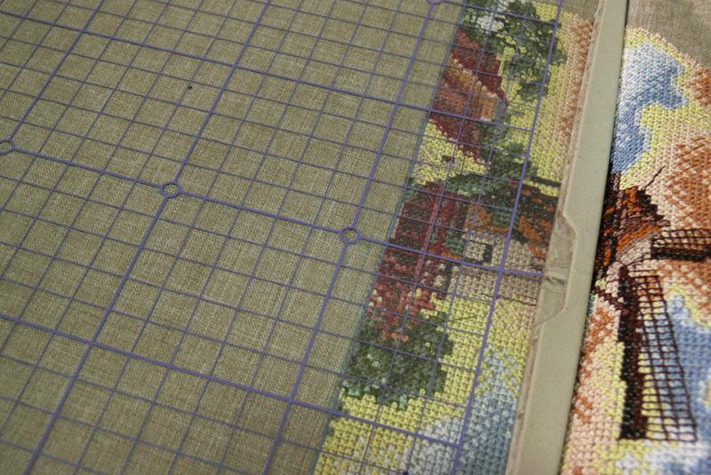 Plastic template for cross stitch alignment