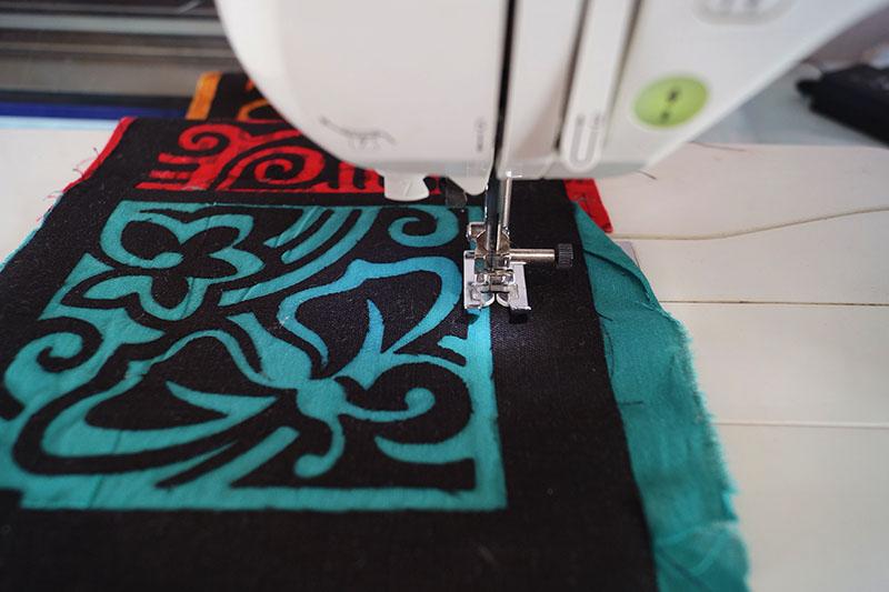 Assembling applique Red and blue applique pieces