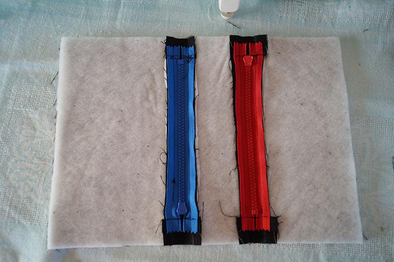 Attaching zippers Red and blue zippers