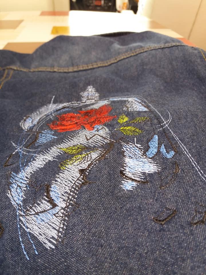 Embroidered jeans jacket with Rose under dome design