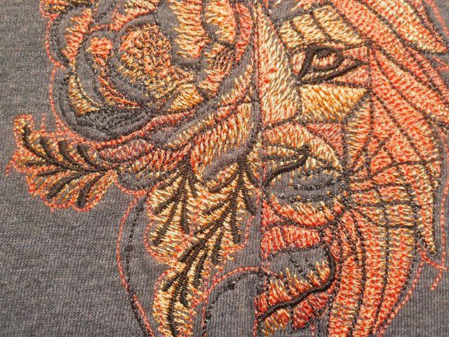 Fantastic lion and flowers embroidery design