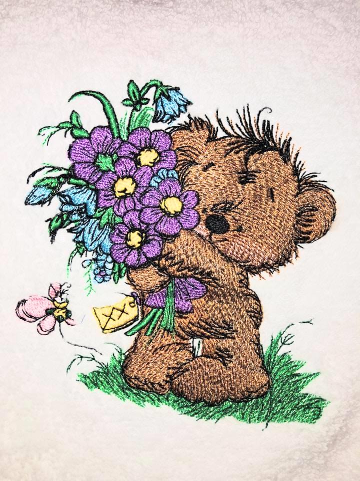 Teddy bear with flowers design