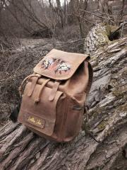 Unleash Your Wild Side: Embroidered Backpack with Tiger Eyes Design