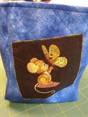 Embroidered basket with Mouse and butterfly design