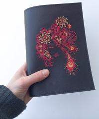 Embroidered cover for notepad with Firebird design