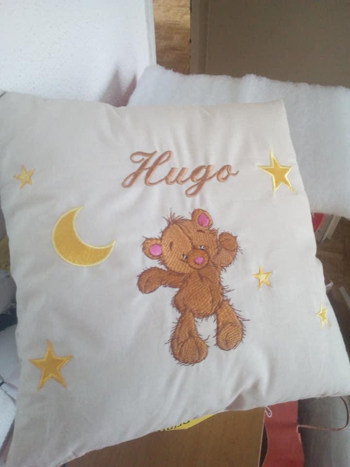 Embroidered cushion with Teddy bear design