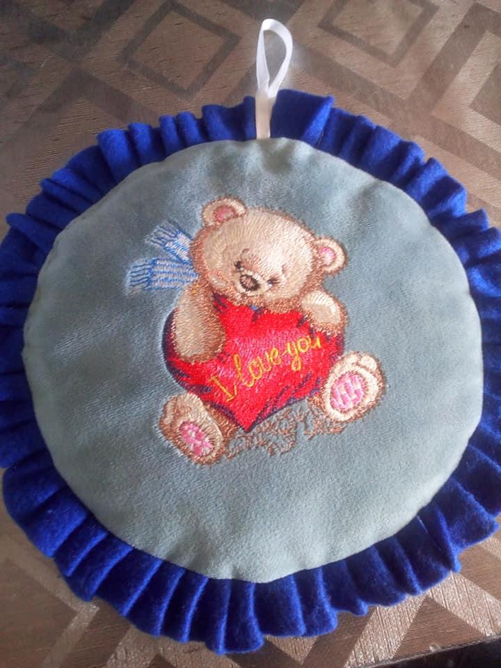 Embroidered cushion with Teddy bear with heart design