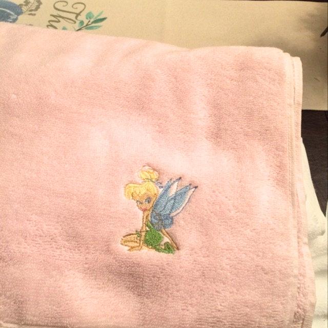 Embroidered towel with Thinkerbell design