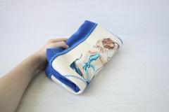 Rolled up embroidered bag with Girl's back design