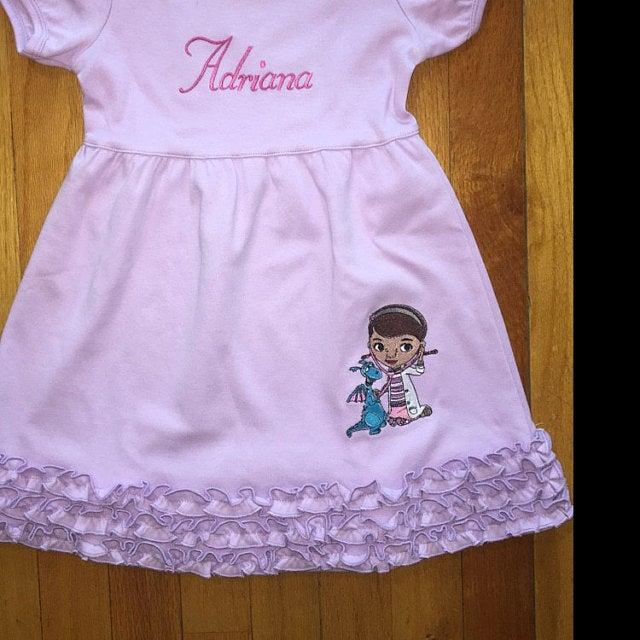 Embroidered dress with Doc McStuffins design