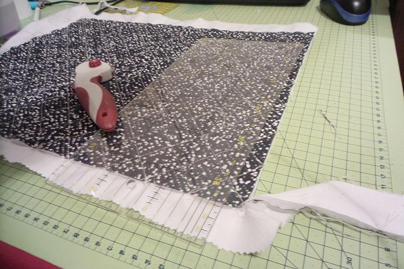 Fabric stitched together Ruler on future placemat