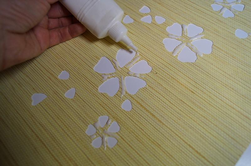 Strengthening narrow parts with glue White craft glue on narrow parts of cut roller shade