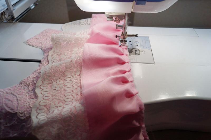 Attaching another tier of ruffles Sewing second tier of ruffles on skirt