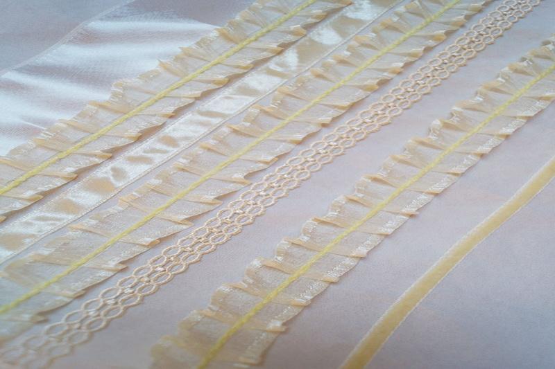 Pleated ribbons on sleeves clother look Various white ribbons clother look