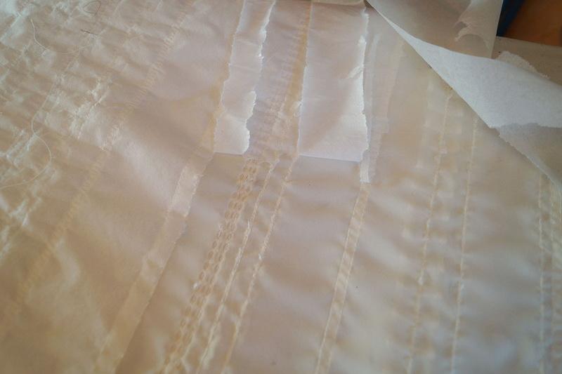 Unstitched sleeve wrong side Fusible interfacing on the wrong side of sleeve