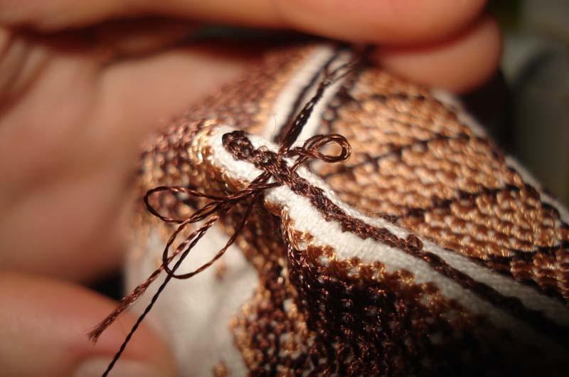 Sewing the opening Opening being sewn