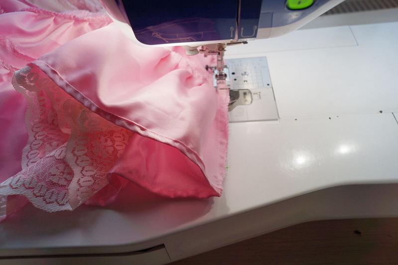 Adding finishing touches Finishing seams of lacy skirt