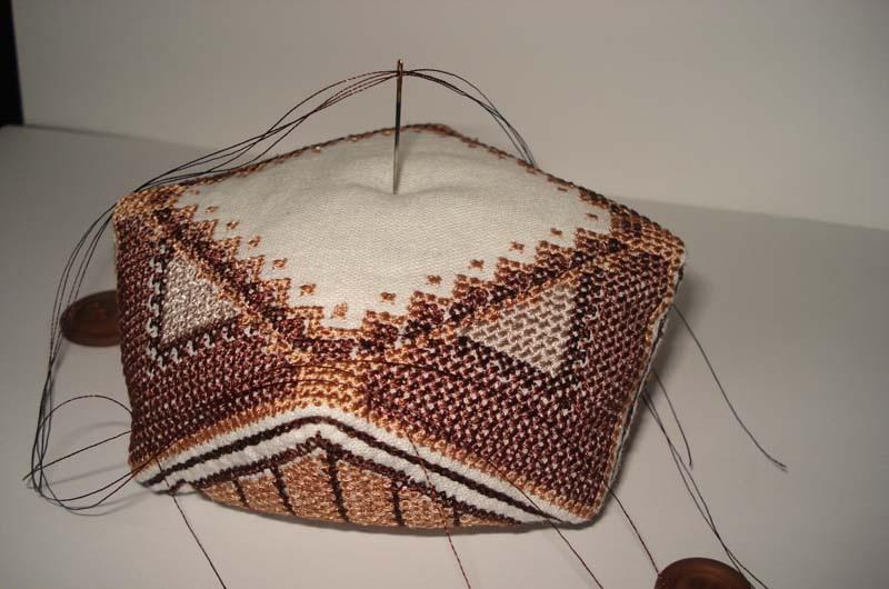 Driving needle through Biscornu with a needle