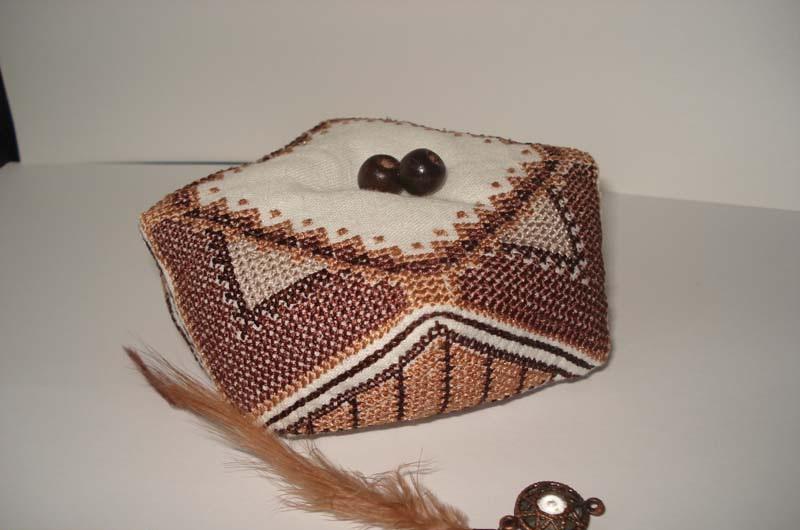 Biscornu with beads and embroidery Biscornu decorated with beads