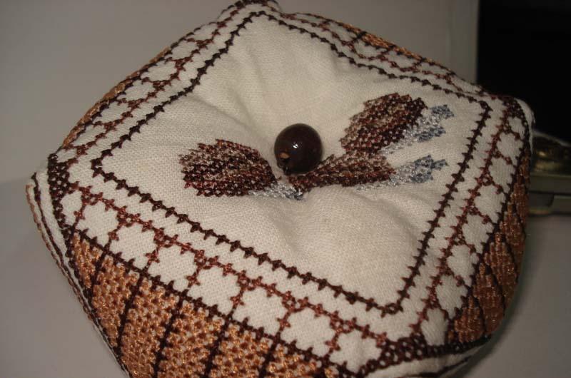 Cross stitch biscornu Biscornu with beads clother look