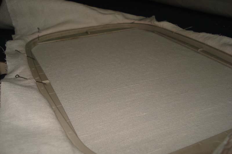 Hooping stabilizer and fabric Stabilizer hooped and pinned