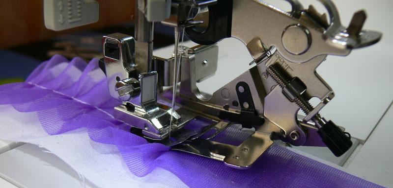 Lilac material to be pleated Lilac ruffled piece in the Ruffler foot