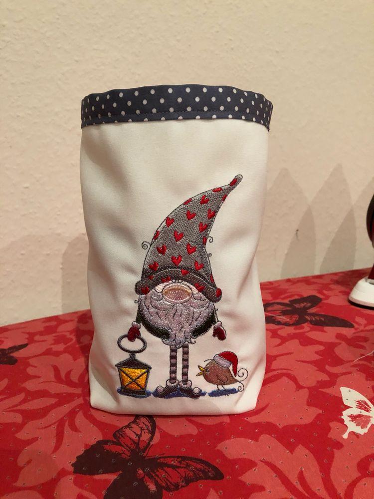 Embroidered basket with Gnome and lantern