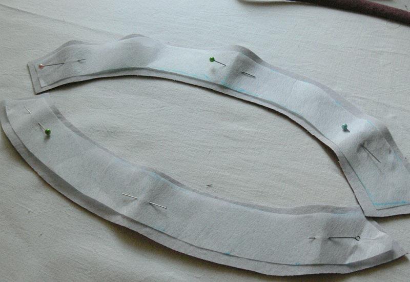 Facing cutouts with pins