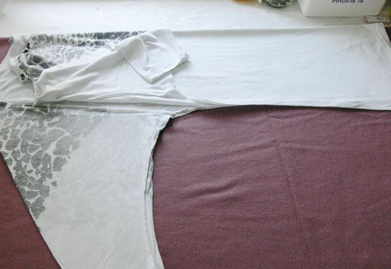 White T-shirt on top of lilac knitwear