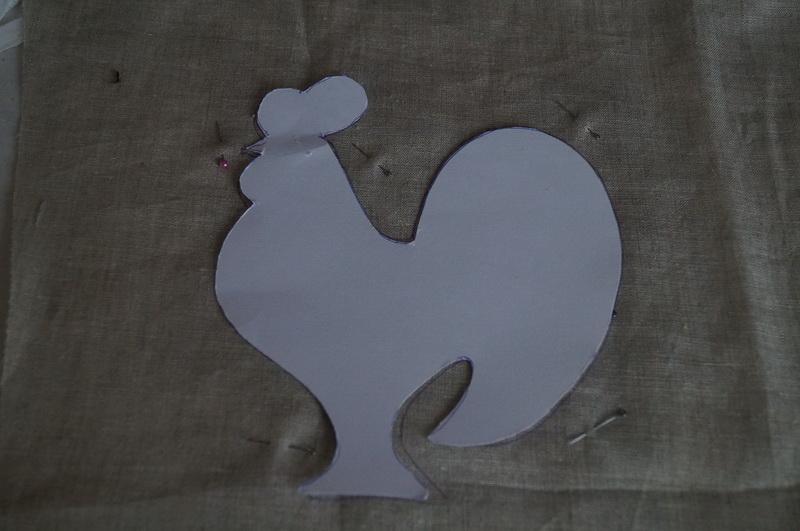 Paper stencil on grey fabric