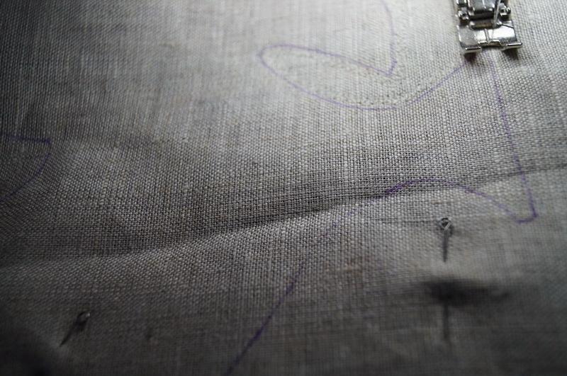 Grey canvas with pins